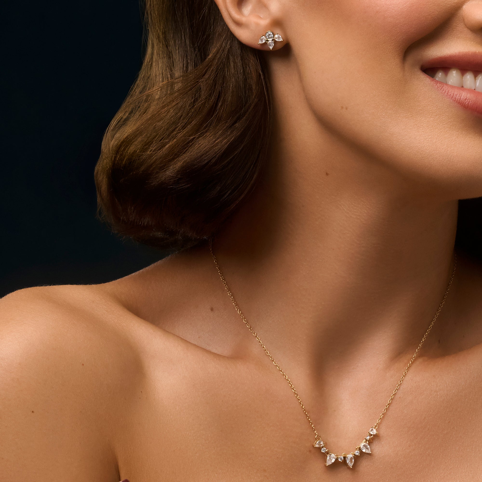 Gold stainless steel necklace with marquise and round cubic zirconia cluster pendant, minimalist fine chain jewelry for sensitive skin, non-tarnish elegant design.