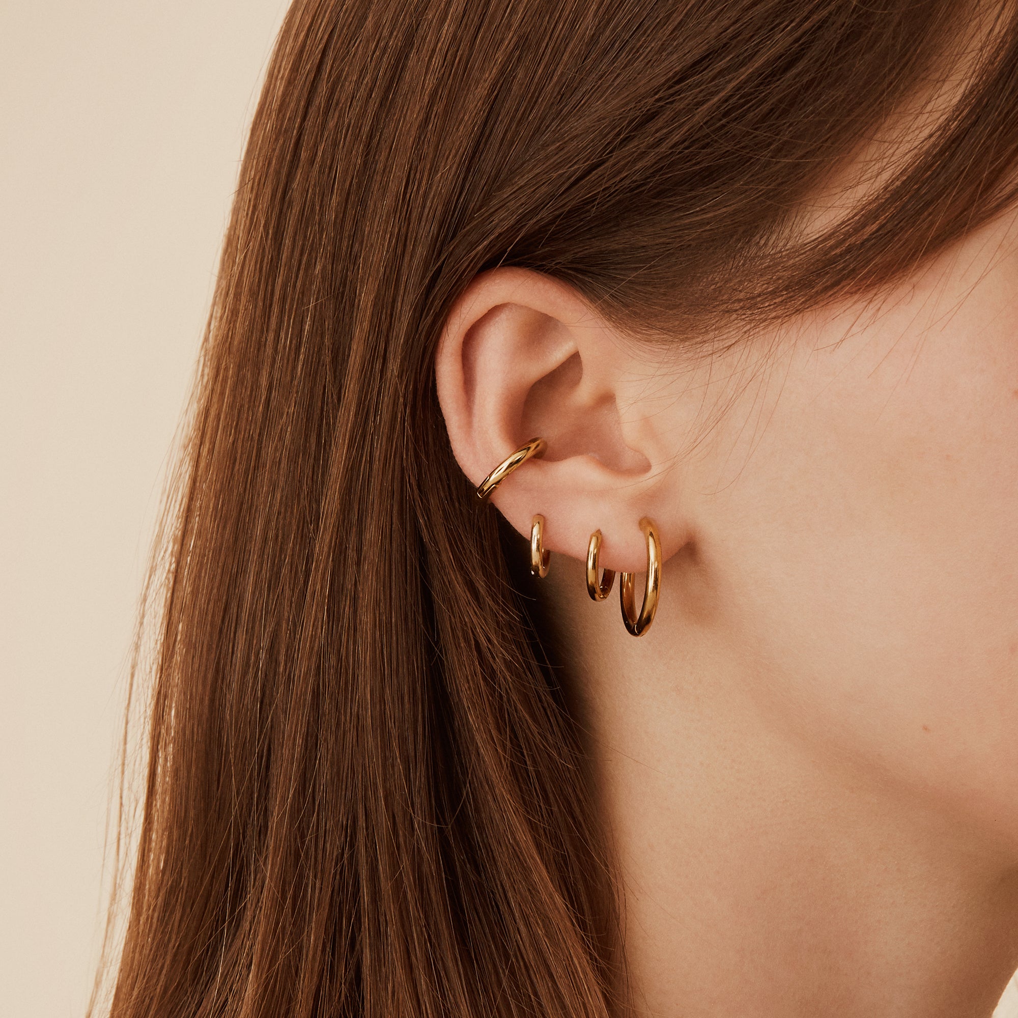 gold minimal stacking hoop earrings trend sustainable jewelry
