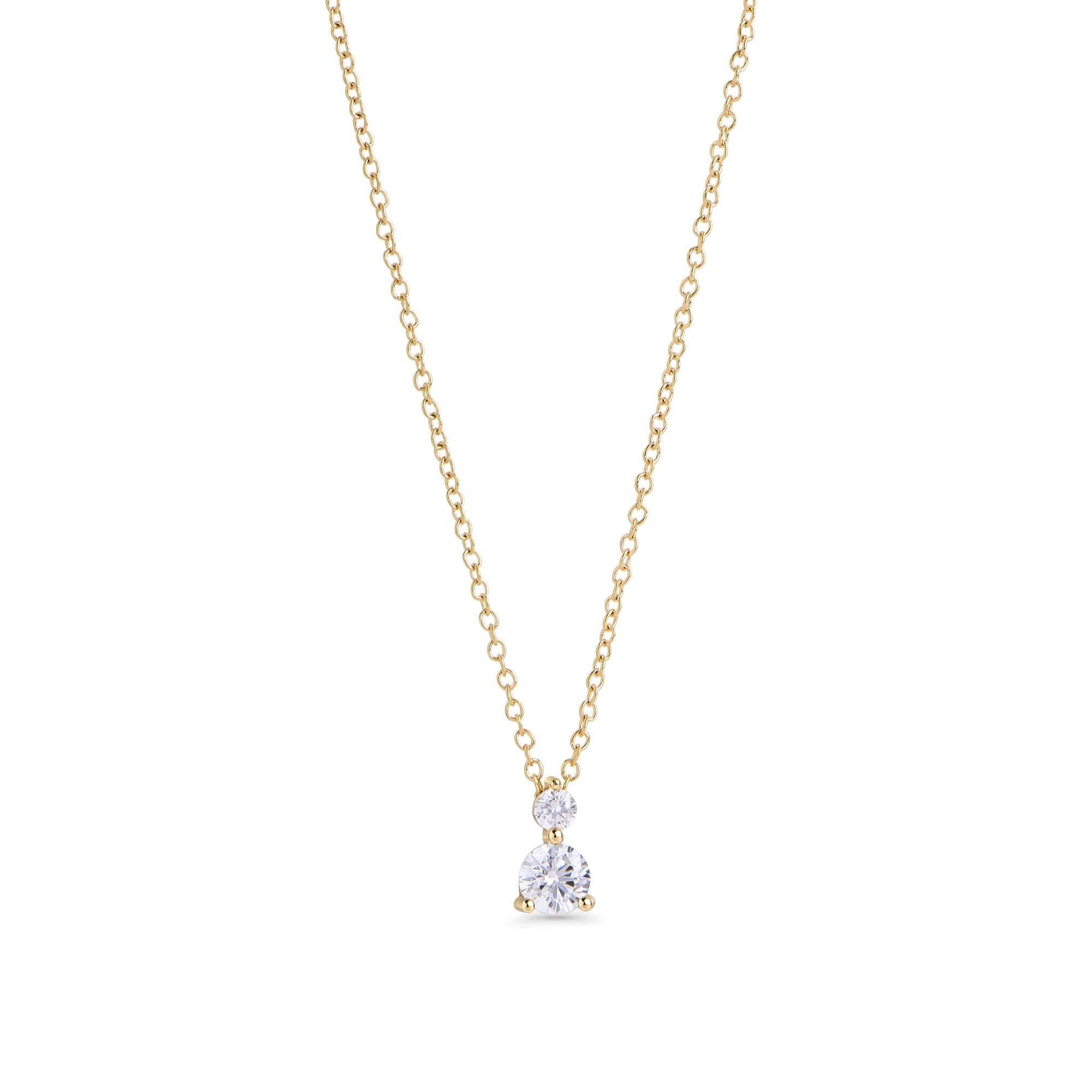 Gold stainless steel pendant necklace with two round cubic zirconia stones, delicate chain with brilliant drop design and timeless minimalist jewelry style.