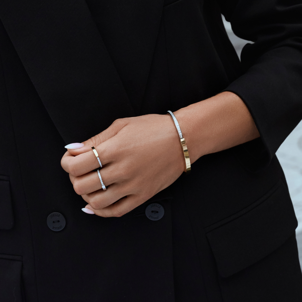 Two-tone stainless steel rings with cubic zirconia pavé and matching bangle bracelet in gold and silver, minimalist elegant jewelry set, hypoallergenic non-tarnish durable everyday jewelry Canada.
