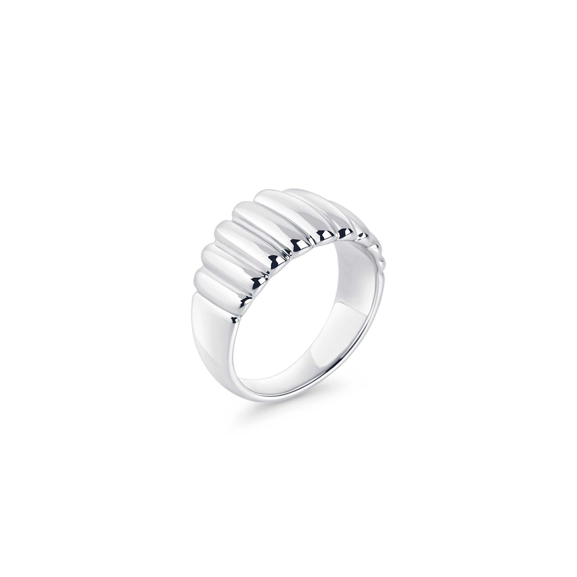 Silver stainless steel ribbed band ring, bold sculptural statement design, hypoallergenic non-tarnish durable jewelry, modern chunky fashion ring for everyday wear.

