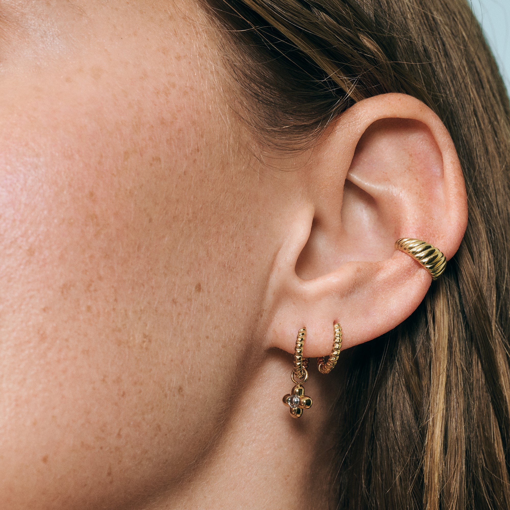 Gold twisted ear cuff, top-rated and best for sensitive ears, allergy-free and hypoallergenic surgical stainless steel, waterproof, non tarnish, safe and designed to prevent skin irritation.