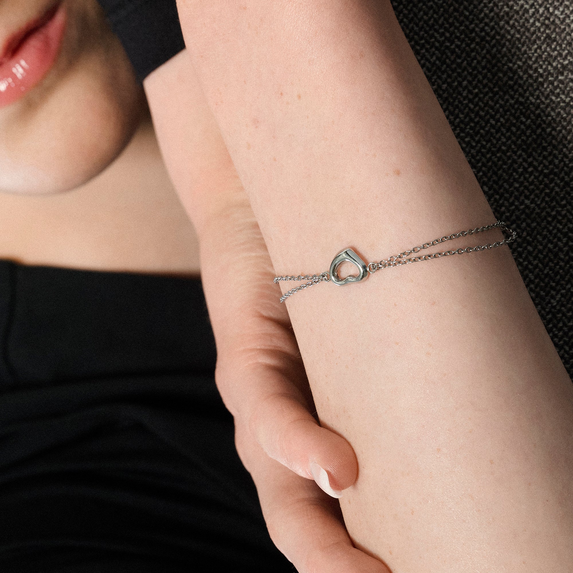 Silver dainty open heart double chain bracelet worn on wrist – allergy-free, waterproof & tarnish-resistant stainless steel bracelet for sensitive skin, meaningful jewelry gift for women by Mia Bijoux Canada