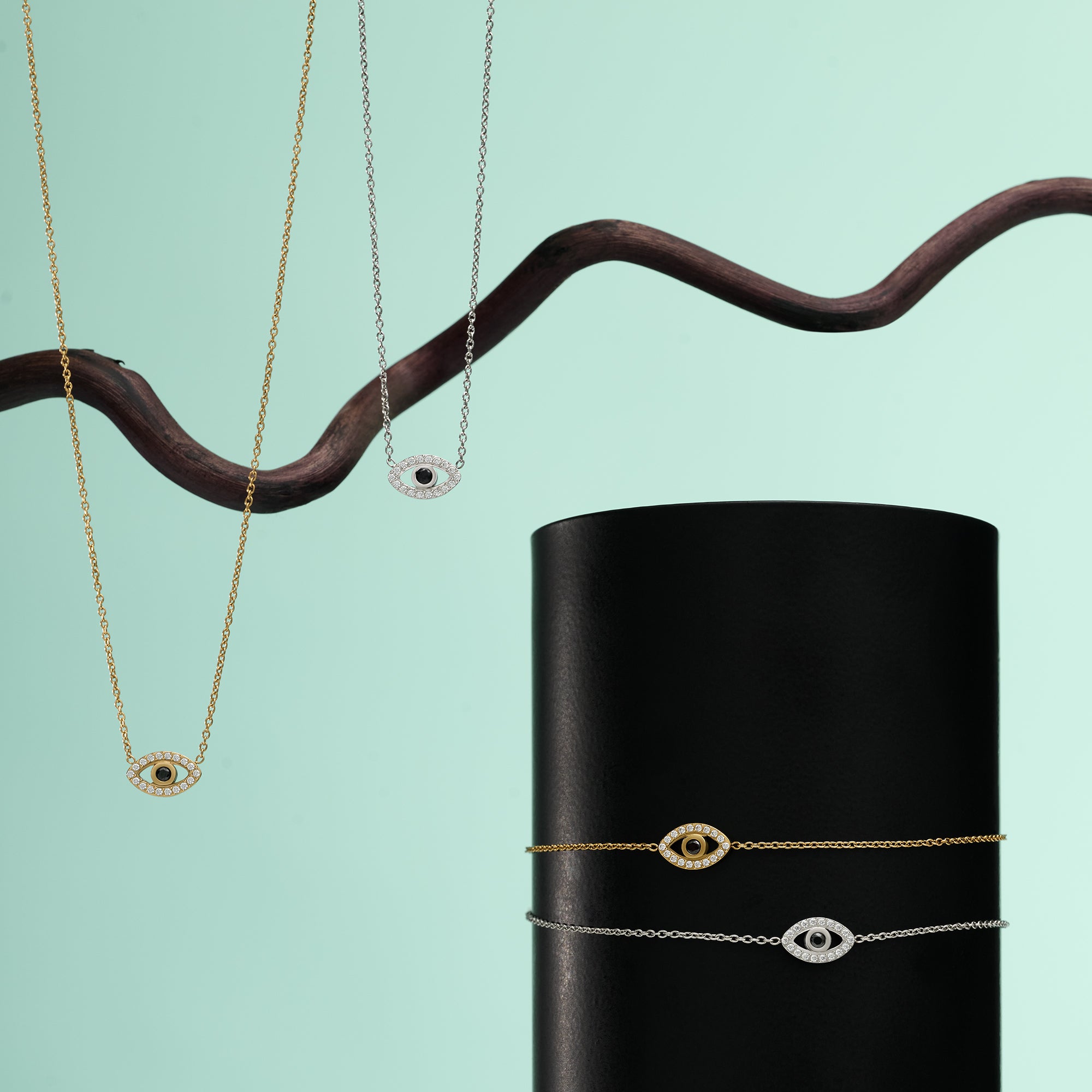 Evil eye gold and silver pendant necklaces with black stone and cubic zirconia, paired with matching evil eye chain bracelets – hypoallergenic, non-tarnish stainless steel jewelry by Mia Bijoux Canada