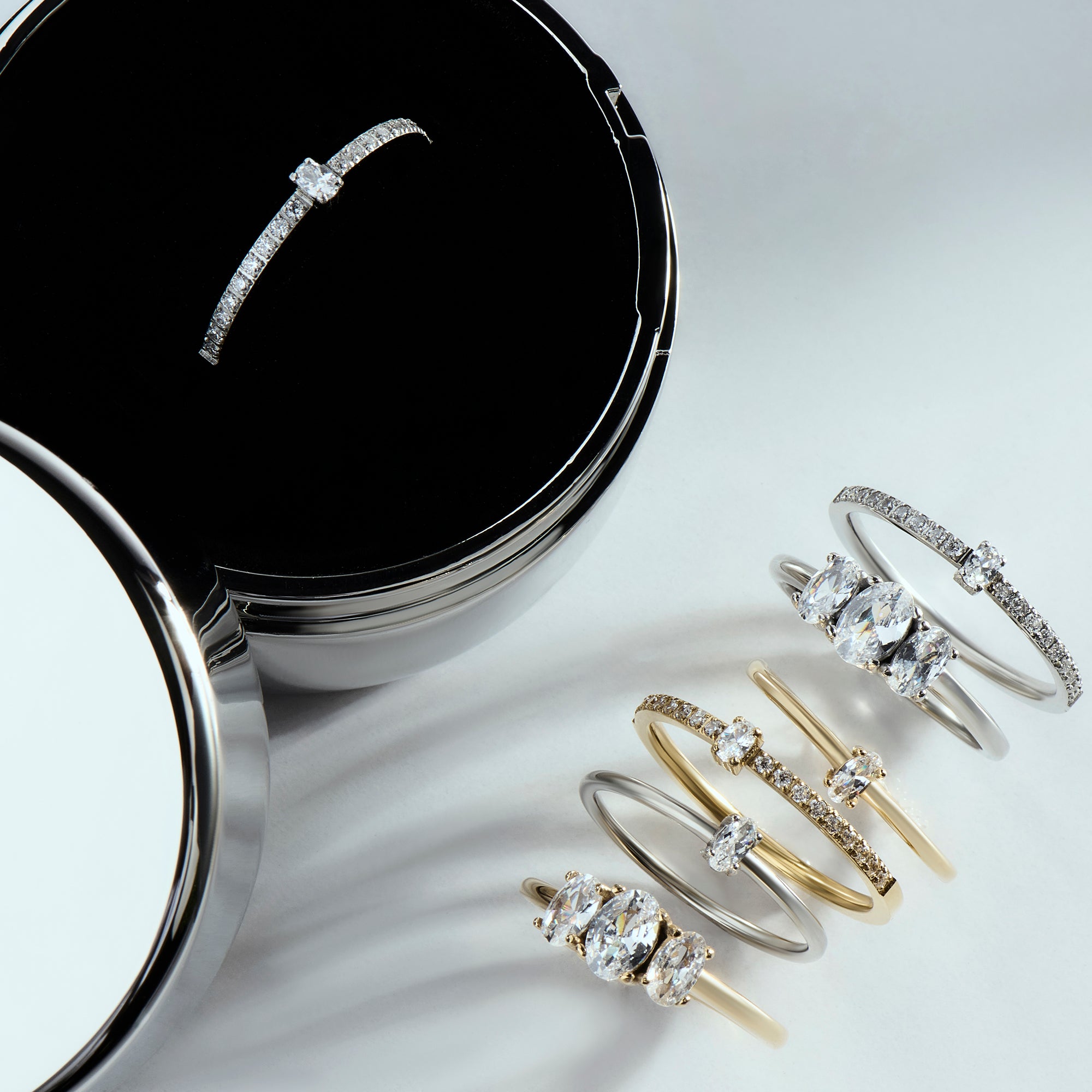 Elegant stainless steel rings with cubic zirconia, gold and silver minimalist stacking rings, hypoallergenic non-tarnish jewelry for sensitive skin, modern delicate engagement-style fashion rings.
