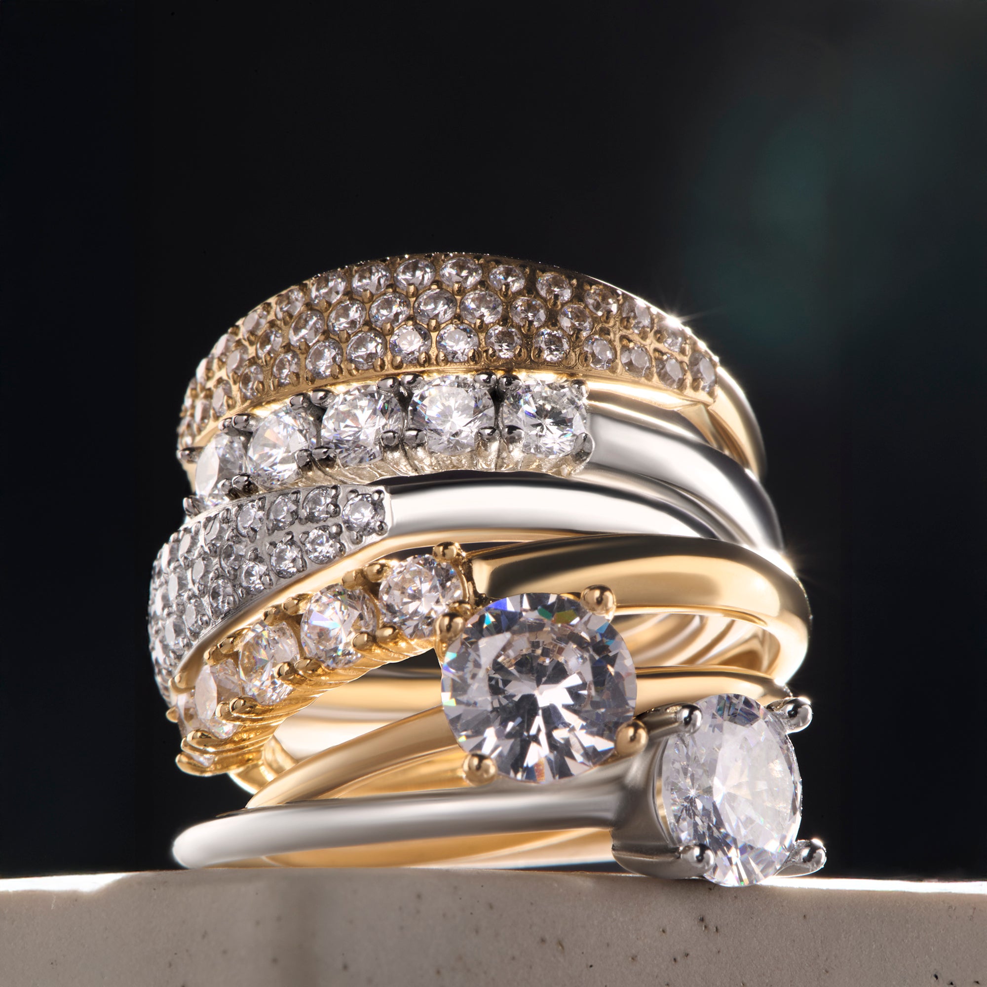Stackable stainless steel rings with cubic zirconia stones, gold and silver durable rings, hypoallergenic tarnish-free jewelry safe for sensitive skin, affordable luxury ring stack Canada.