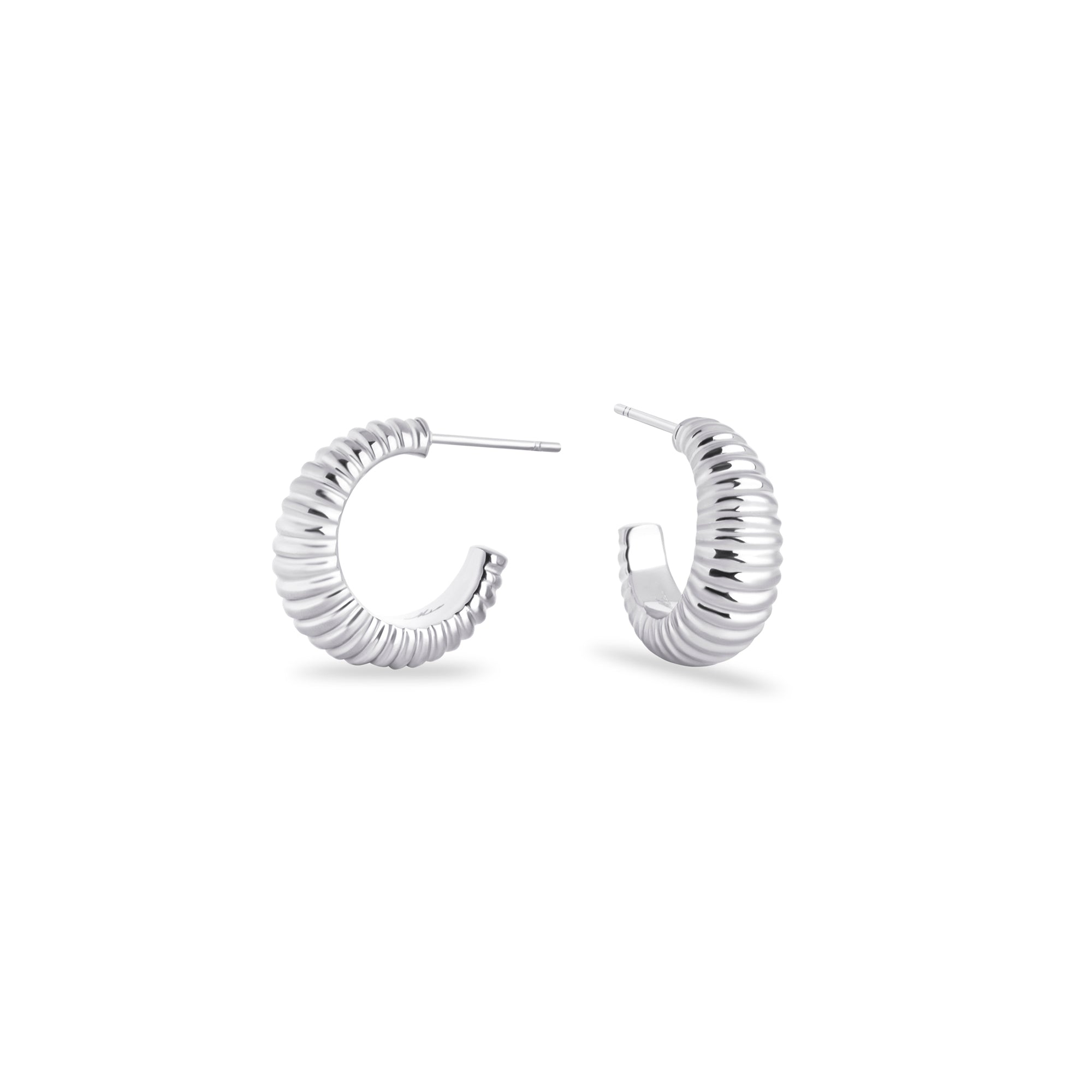 Polished stainless steel hoop earrings with a modern ribbed design for a chic and timeless look. MIAJWL