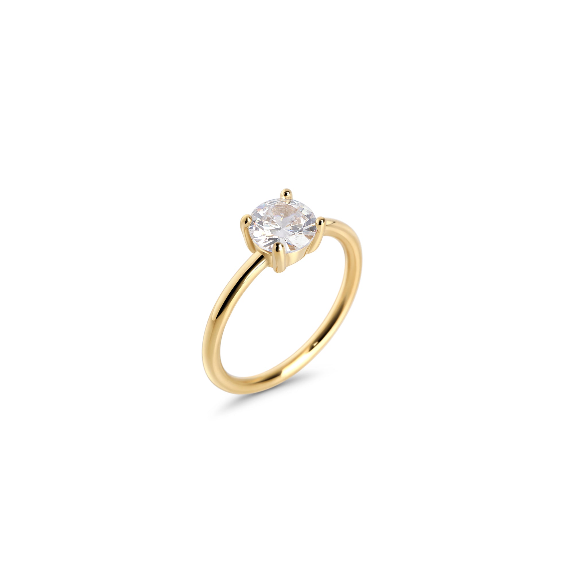 Gold stainless steel solitaire ring with round cubic zirconia, classic engagement-style ring design, durable minimalist jewelry with brilliant stone for an elegant timeless look.